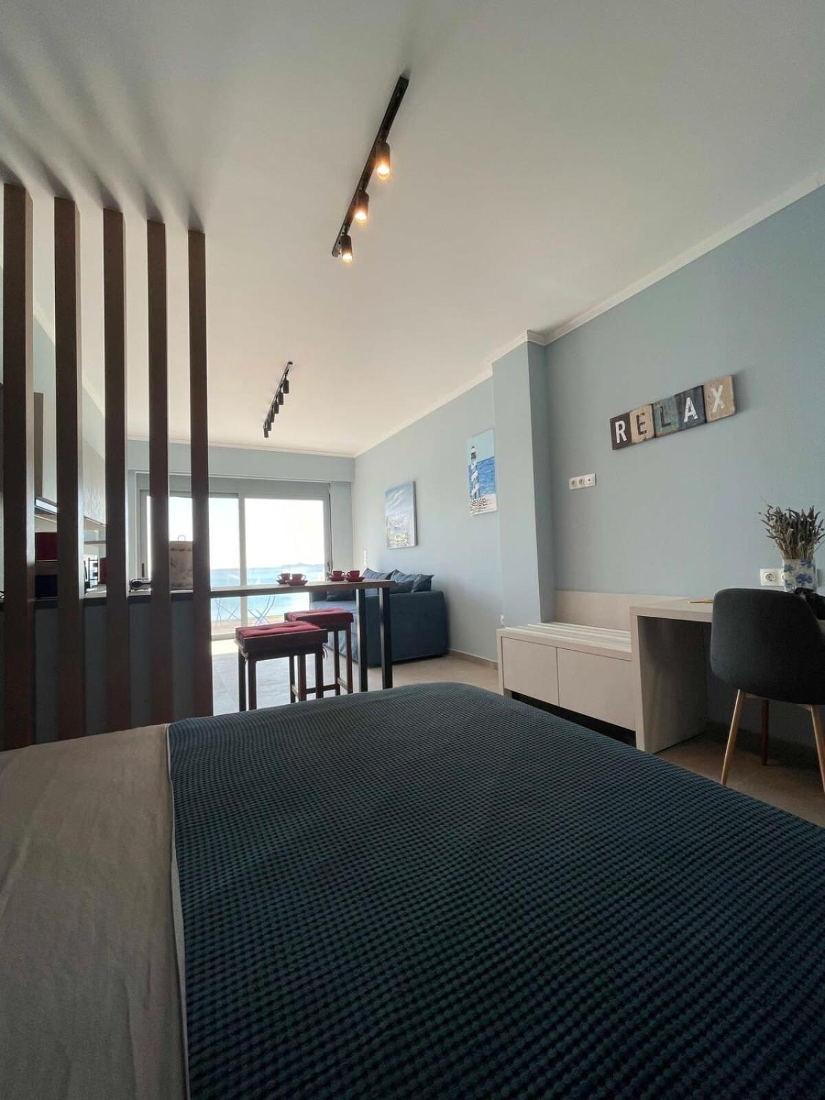 Escape Chic With Seafront Patio Charaki